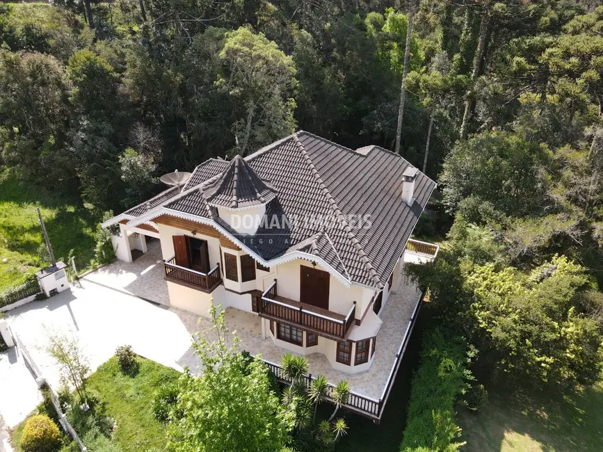 Foto 1 de Casa de Condomínio com 4 quartos à venda, 402m2 em Campos Do Jordao - SP
