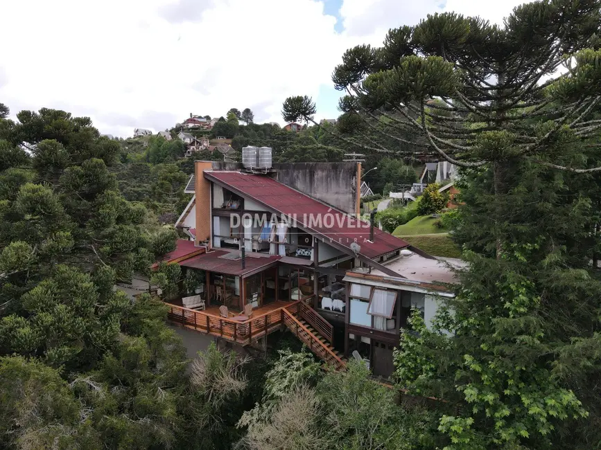 Foto 2 de Casa de Condomínio com 6 quartos à venda, 302m2 em Campos Do Jordao - SP