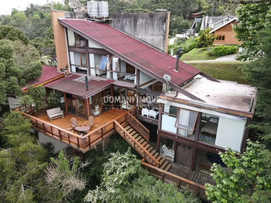 Foto 1 de Casa de Condomínio com 6 quartos à venda, 302m2 em Campos Do Jordao - SP