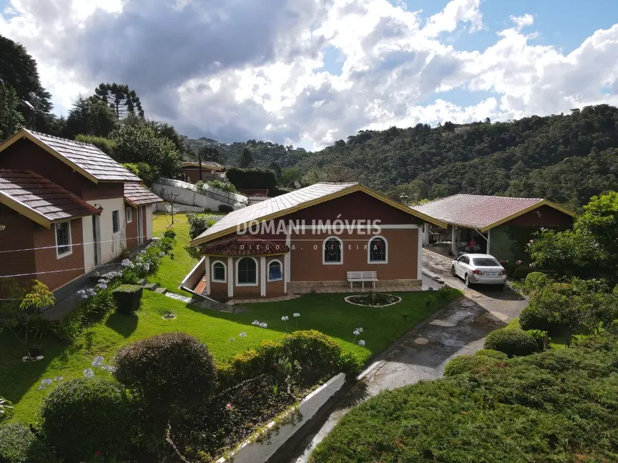 Foto 1 de Casa com 4 quartos à venda, 310m2 em Campos Do Jordao - SP