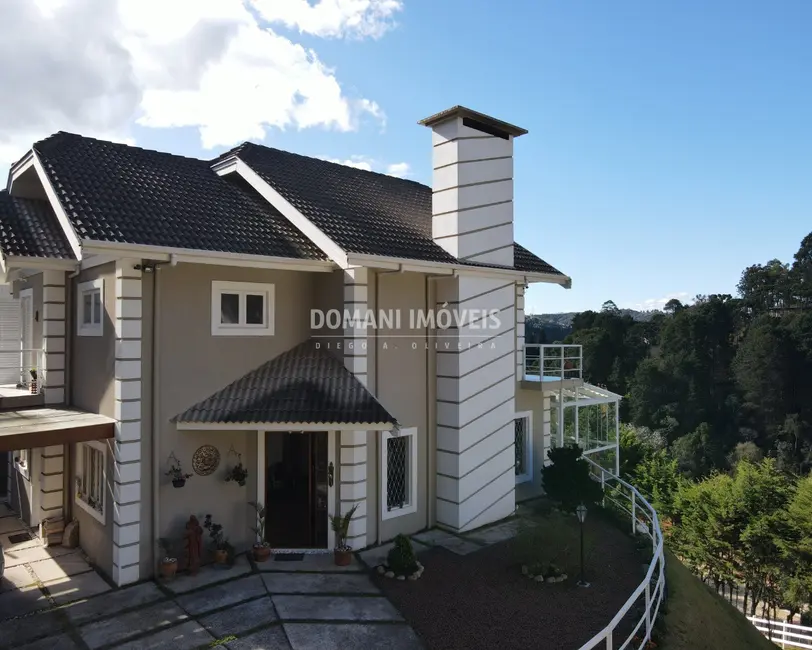 Foto 5 de Casa com 4 quartos à venda, 215m2 em Campos Do Jordao - SP