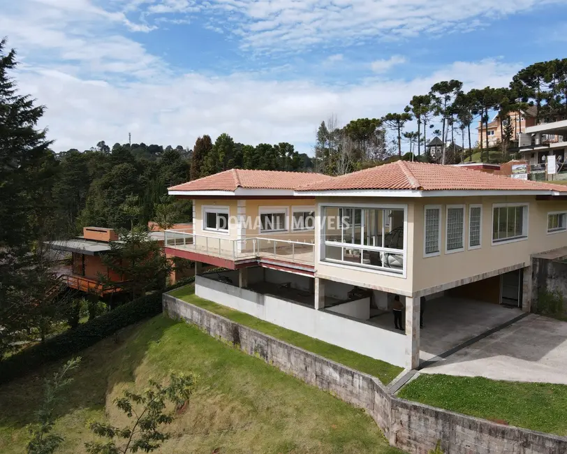 Foto 1 de Casa de Condomínio com 3 quartos à venda, 430m2 em Campos Do Jordao - SP