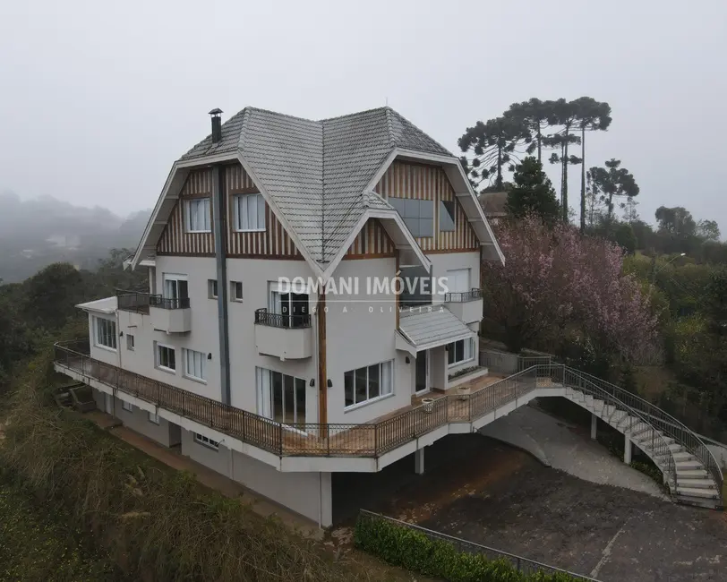 Casa de Condomínio com 6 quartos à venda, 798m2 em Campos Do Jordao - SP - imagem 1 Foto 1 de Casa de Condomínio com 6 quartos à venda, 798m2 em Campos Do Jordao - SP