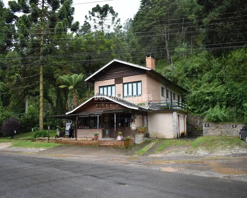 Foto 1 de Casa com 4 quartos à venda, 165m2 em Campos Do Jordao - SP