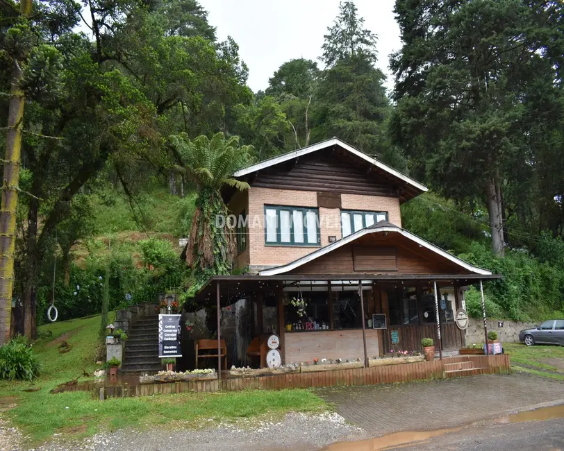 Foto 3 de Casa com 4 quartos à venda, 165m2 em Campos Do Jordao - SP