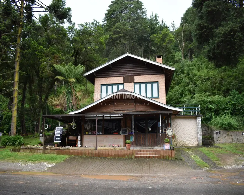 Foto 2 de Casa com 4 quartos à venda, 165m2 em Campos Do Jordao - SP