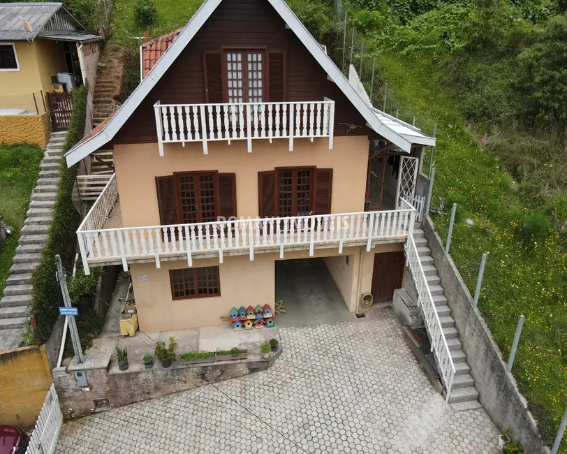 Foto 2 de Casa com 4 quartos à venda, 168m2 em Campos Do Jordao - SP