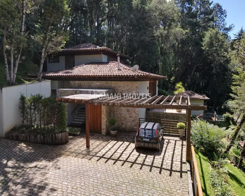 Foto 1 de Casa de Condomínio com 5 quartos à venda, 380m2 em Campos Do Jordao - SP