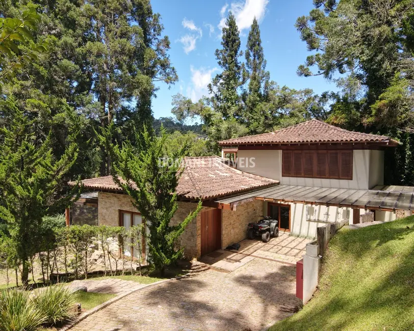 Foto 1 de Casa de Condomínio com 4 quartos à venda, 405m2 em Campos Do Jordao - SP