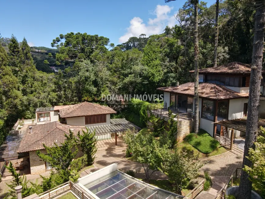 Foto 1 de Casa de Condomínio com 4 quartos à venda, 375m2 em Campos Do Jordao - SP