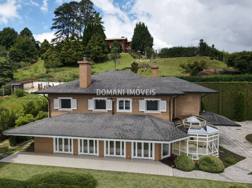 Foto 2 de Casa com 4 quartos à venda, 672m2 em Campos Do Jordao - SP