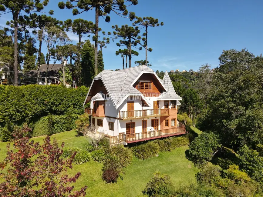 Foto 1 de Casa de Condomínio com 4 quartos à venda, 450m2 em Campos Do Jordao - SP