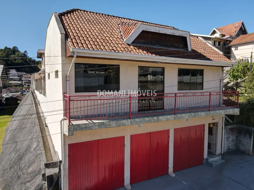 Foto 1 de Casa com 4 quartos à venda em Campos Do Jordao - SP