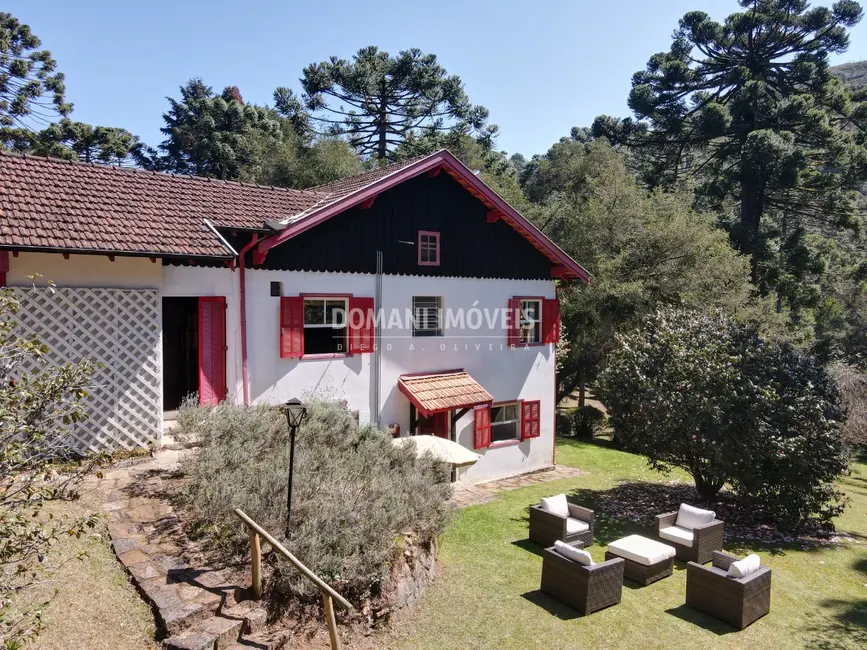 Foto 1 de Casa com 4 quartos à venda, 340m2 em Campos Do Jordao - SP