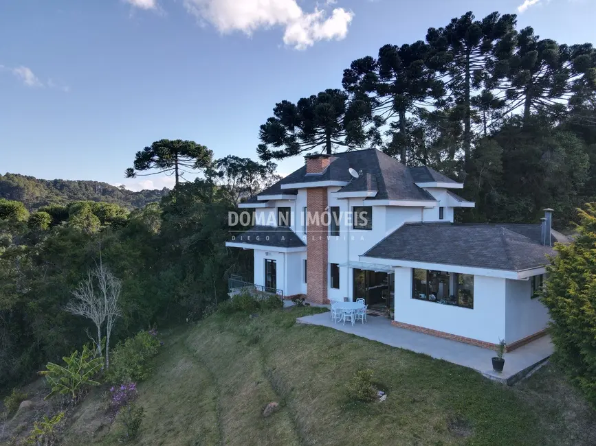 Foto 1 de Casa de Condomínio com 4 quartos à venda, 197m2 em Campos Do Jordao - SP