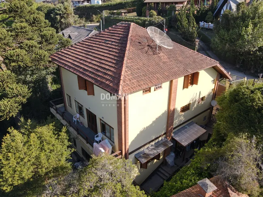 Foto 2 de Casa com 4 quartos à venda, 442m2 em Campos Do Jordao - SP