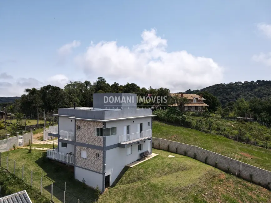 Foto 2 de Casa com 4 quartos à venda, 272m2 em Campos Do Jordao - SP