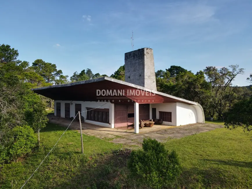 Foto 6 de Casa com 4 quartos à venda, 372m2 em Campos Do Jordao - SP