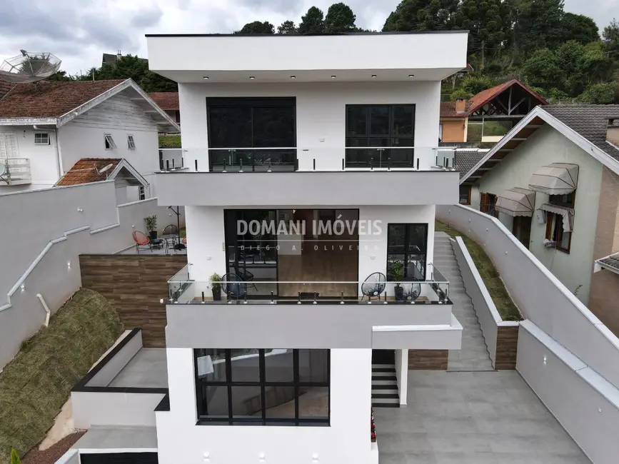 Foto 7 de Casa com 4 quartos à venda, 309m2 em Campos Do Jordao - SP