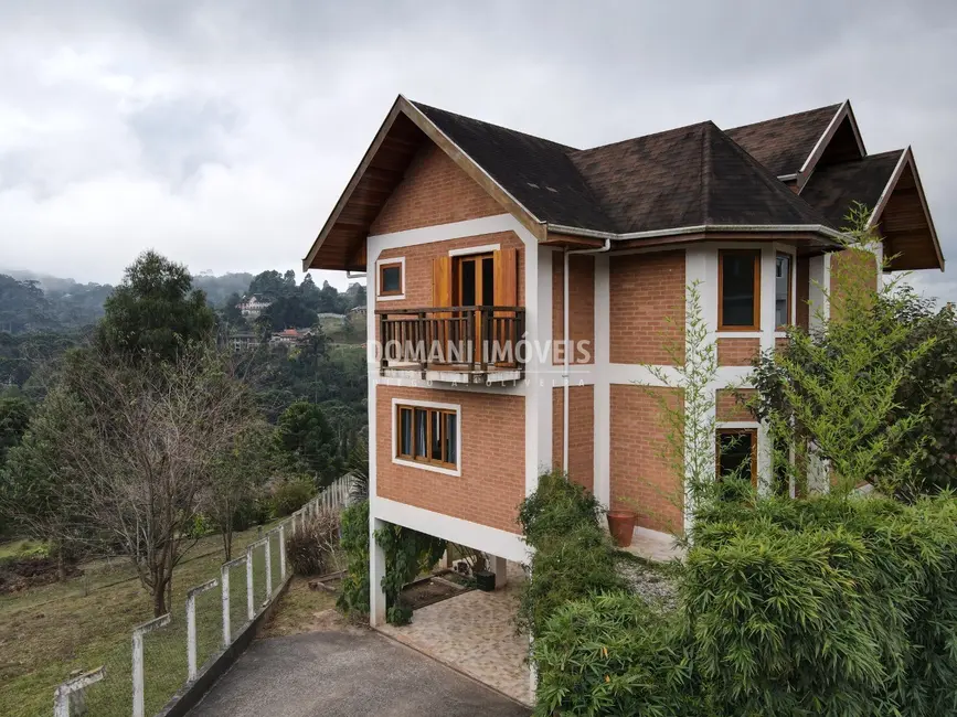 Foto 1 de Casa de Condomínio com 4 quartos à venda, 212m2 em Campos Do Jordao - SP