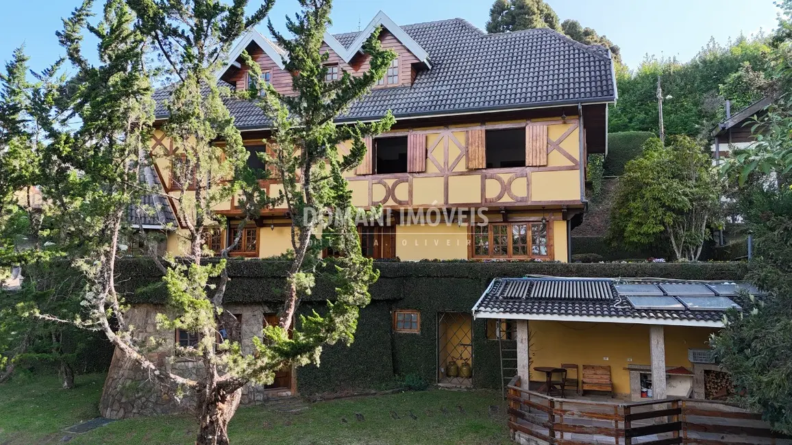Foto 6 de Casa com 6 quartos à venda, 576m2 em Campos Do Jordao - SP