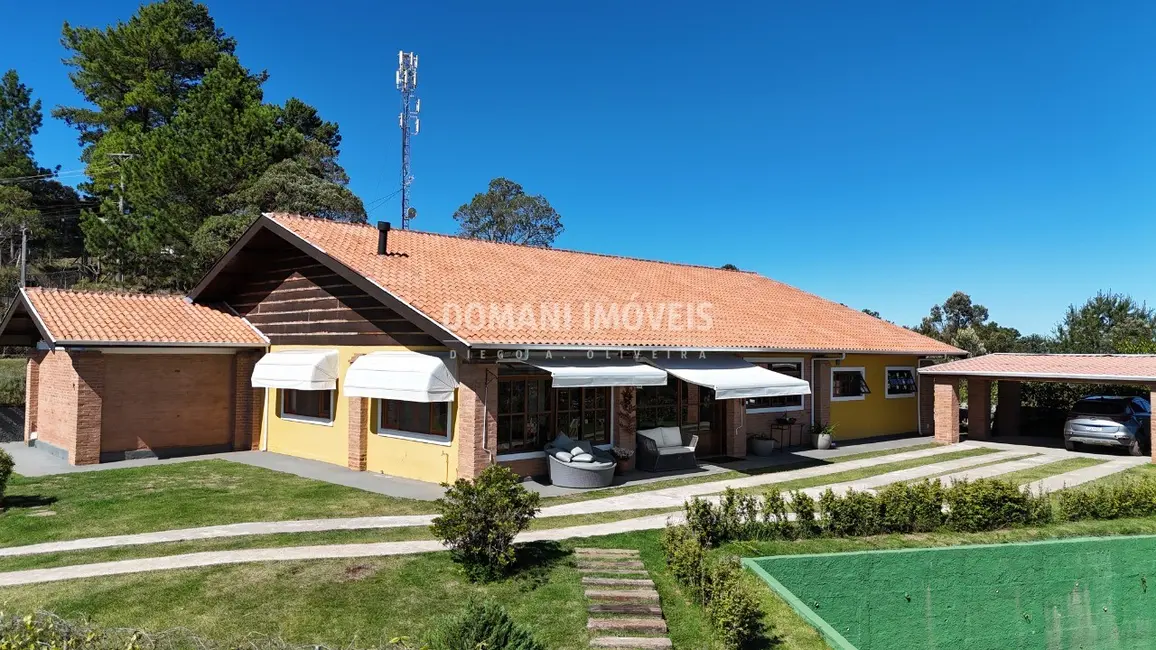 Foto 2 de Casa com 4 quartos à venda, 390m2 em Campos Do Jordao - SP