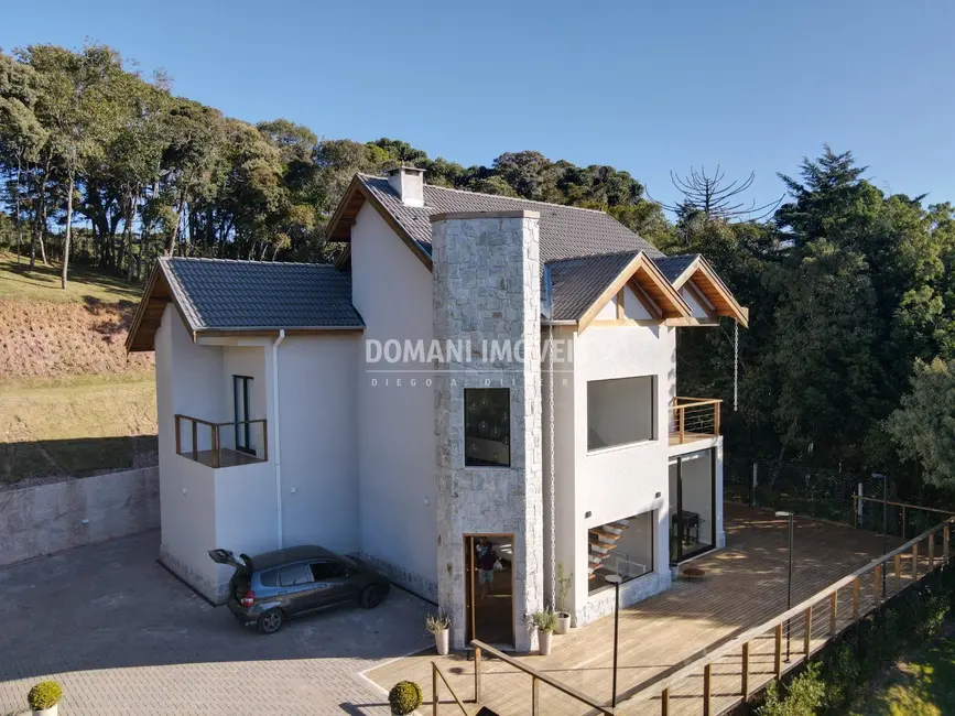 Foto 7 de Casa com 5 quartos à venda, 205m2 em Campos Do Jordao - SP