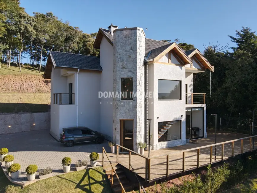 Foto 2 de Casa com 5 quartos à venda, 205m2 em Campos Do Jordao - SP