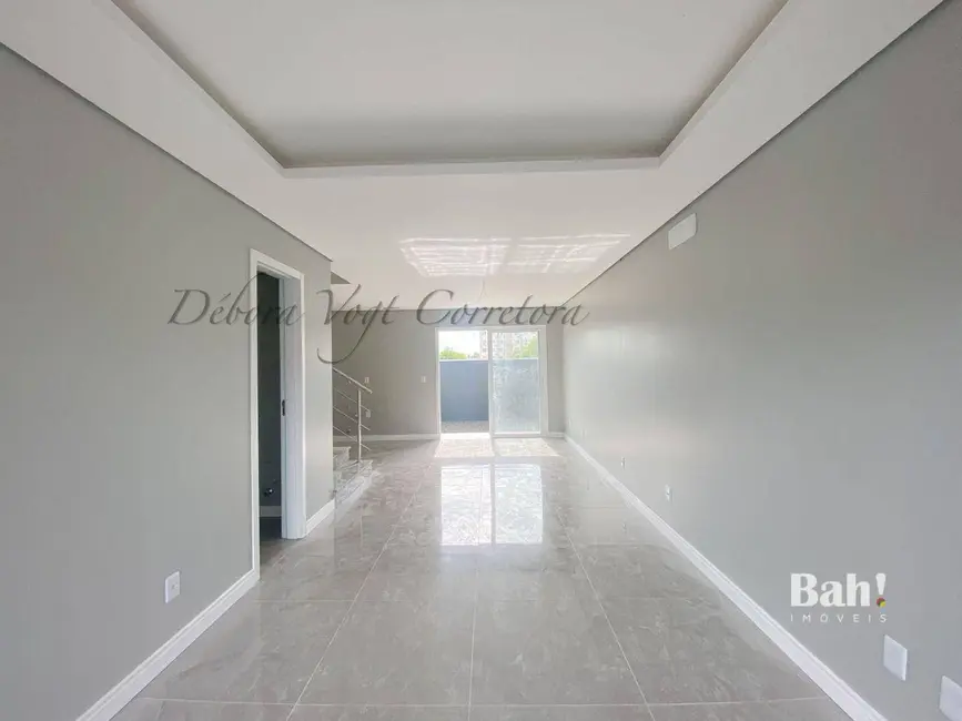 Sobrado com 3 quartos à venda, 180m2 em Estância Velha, Canoas - RS - imagem 5 Foto 5 de Sobrado com 3 quartos à venda, 180m2 em Estância Velha, Canoas - RS