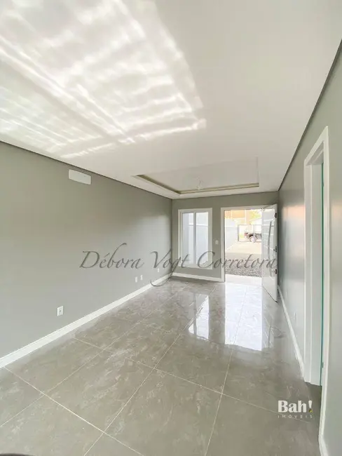 Sobrado com 3 quartos à venda, 180m2 em Estância Velha, Canoas - RS - imagem 7 Foto 7 de Sobrado com 3 quartos à venda, 180m2 em Estância Velha, Canoas - RS