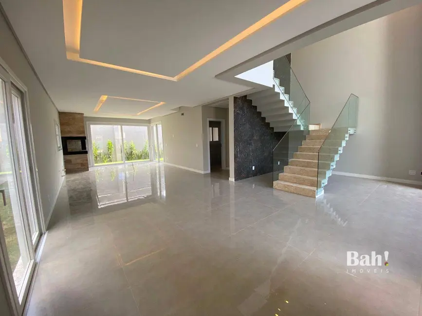 Sobrado com 4 quartos à venda, 230m2 em Igara, Canoas - RS - imagem 7 Foto 7 de Sobrado com 4 quartos à venda, 230m2 em Igara, Canoas - RS