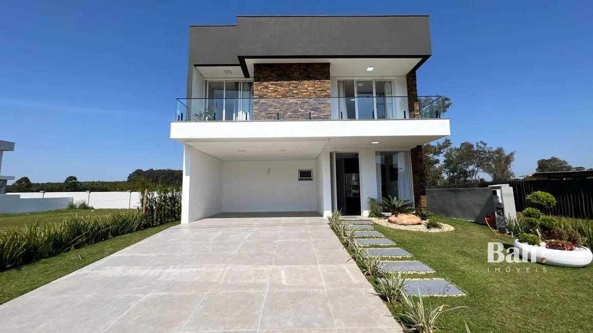 Foto 1 de Sobrado com 4 quartos à venda, 360m2 em Nova Santa Rita - RS