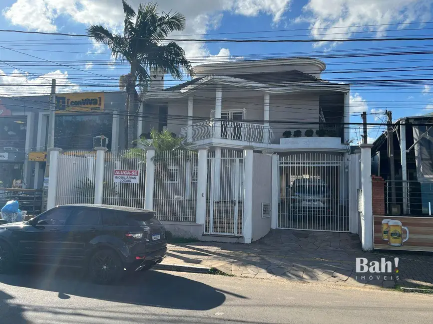 Foto 1 de Sobrado com 4 quartos à venda, 360m2 em Marechal Rondon, Canoas - RS