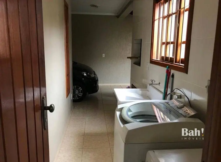 Sobrado com 3 quartos à venda, 200m2 em Estância Velha, Canoas - RS - imagem 7 Foto 7 de Sobrado com 3 quartos à venda, 200m2 em Estância Velha, Canoas - RS