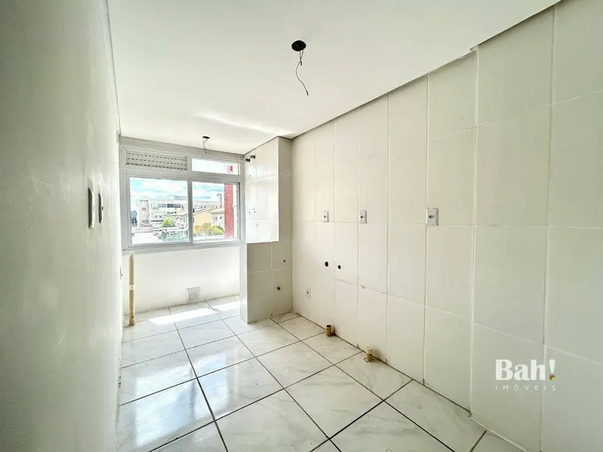 Apartamento com 2 quartos à venda, 56m2 em Marechal Rondon, Canoas - RS - imagem 3 Foto 3 de Apartamento com 2 quartos à venda, 56m2 em Marechal Rondon, Canoas - RS