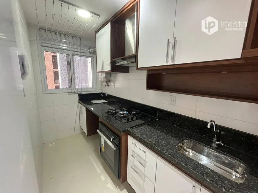 Apartamento com 2 quartos para alugar, 64m2 em Praia de Itaparica, Vila Velha - ES - imagem 3 Foto 3 de Apartamento com 2 quartos para alugar, 64m2 em Praia de Itaparica, Vila Velha - ES