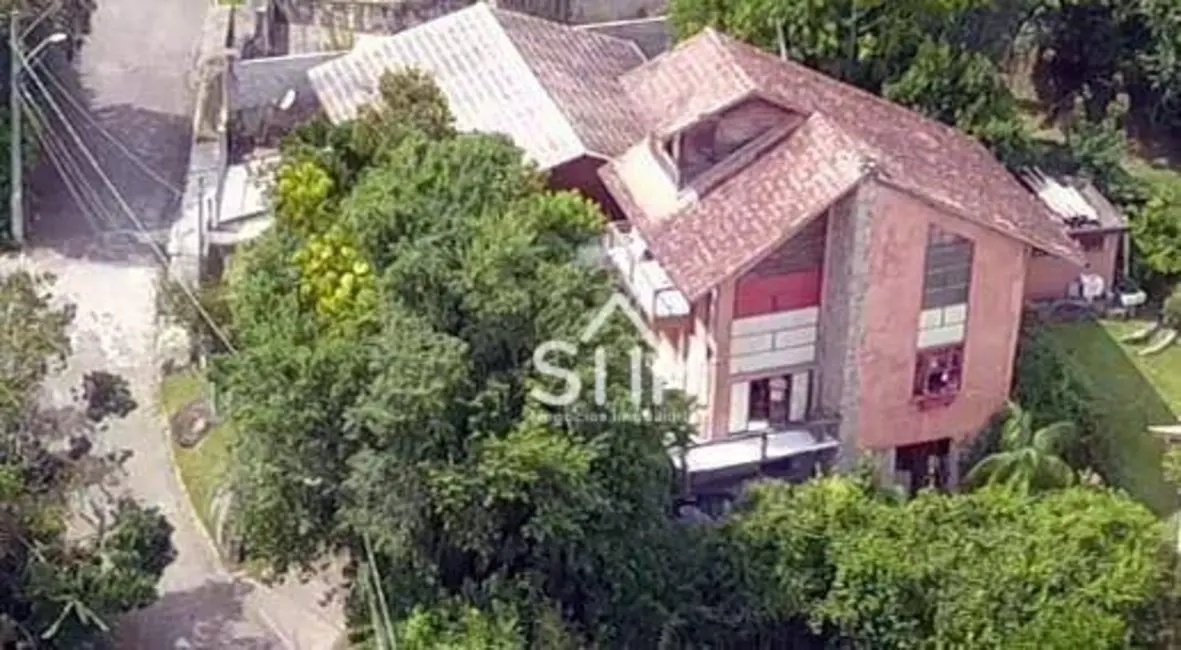 Foto 1 de Casa com 3 quartos à venda, 558m2 em Cacupé, Florianopolis - SC