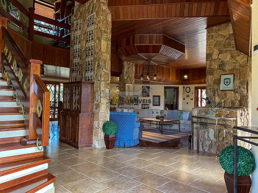 Foto 7 de Casa com 7 quartos à venda, 687m2 em Campos Do Jordao - SP
