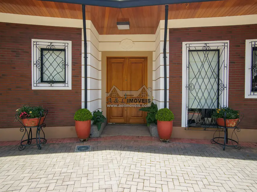 Foto 5 de Casa com 5 quartos à venda, 424m2 em Campos Do Jordao - SP