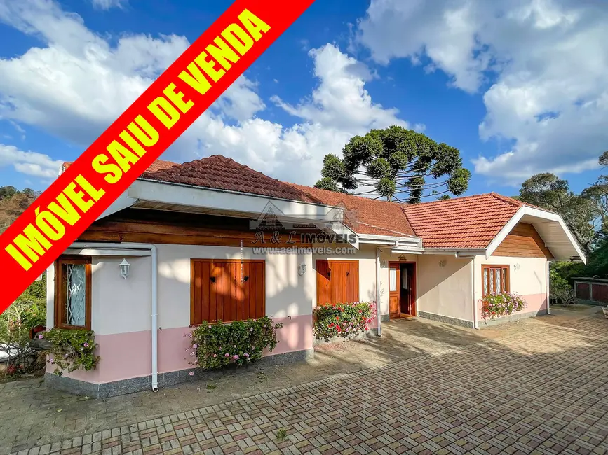 Foto 1 de Casa de Condomínio com 4 quartos à venda, 165m2 em Campos Do Jordao - SP