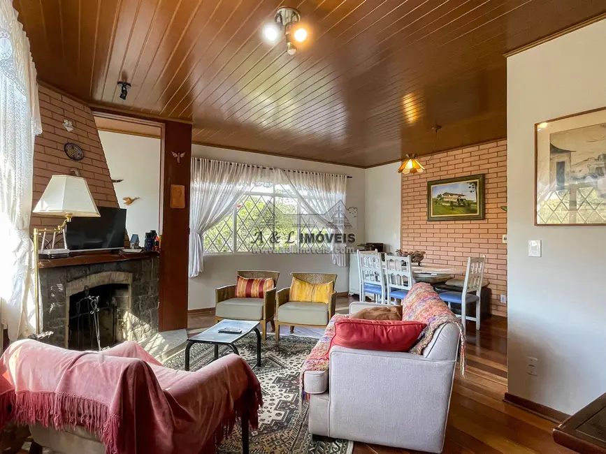 Foto 1 de Casa de Condomínio com 4 quartos à venda, 100m2 em Campos Do Jordao - SP