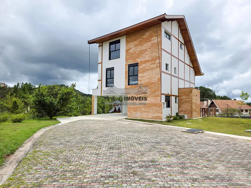Foto 2 de Casa de Condomínio com 4 quartos à venda, 254m2 em Campos Do Jordao - SP
