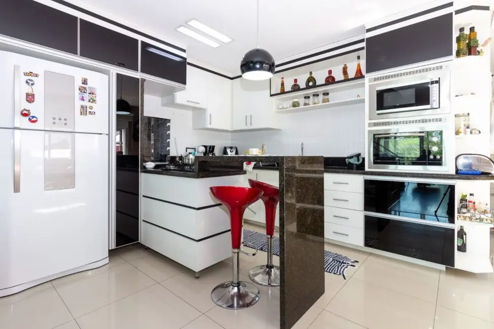 Casa com 3 quartos à venda, 253m2 em Costa e Silva, Porto Alegre - RS - imagem 6 Foto 6 de Casa com 3 quartos à venda, 253m2 em Costa e Silva, Porto Alegre - RS