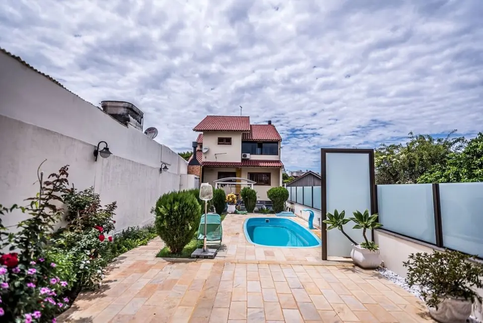 Foto 1 de Casa com 4 quartos à venda, 300m2 em Sarandi, Porto Alegre - RS