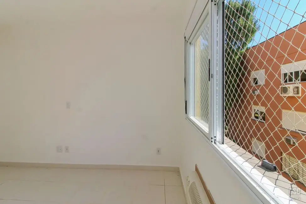 Foto 4 de Apartamento com 3 quartos à venda, 67m2 em Guarujá, Porto Alegre - RS