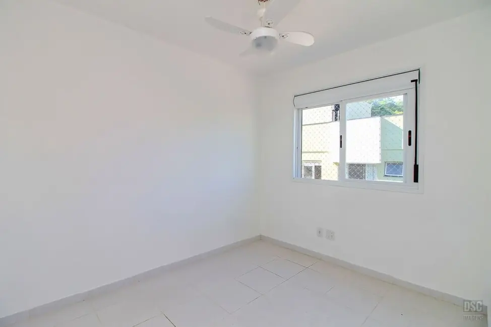 Foto 8 de Apartamento com 3 quartos à venda, 67m2 em Guarujá, Porto Alegre - RS