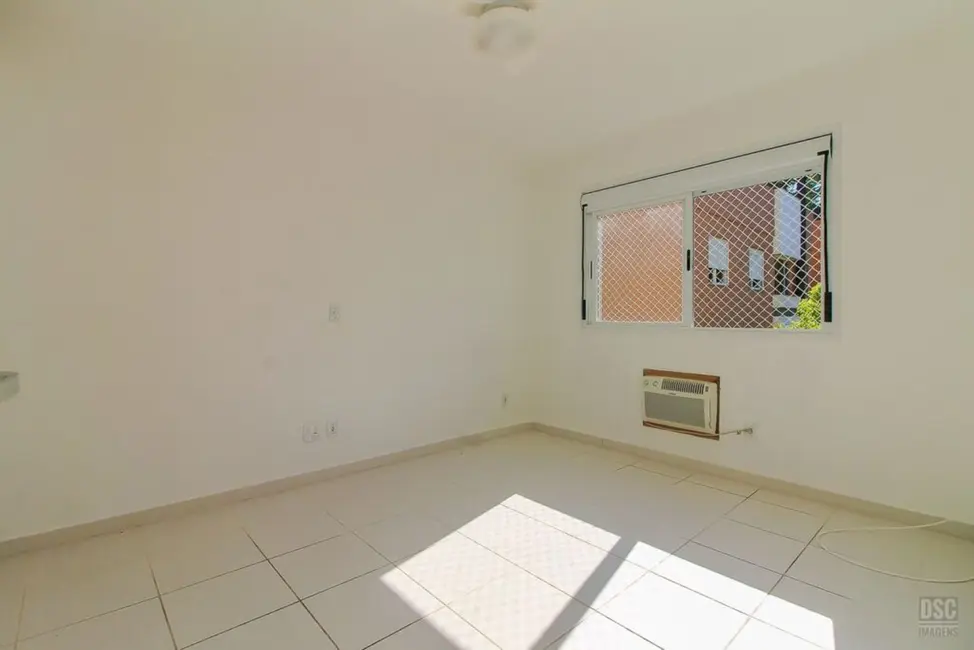 Foto 1 de Apartamento com 3 quartos à venda, 67m2 em Guarujá, Porto Alegre - RS