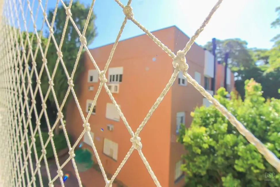 Foto 5 de Apartamento com 3 quartos à venda, 67m2 em Guarujá, Porto Alegre - RS