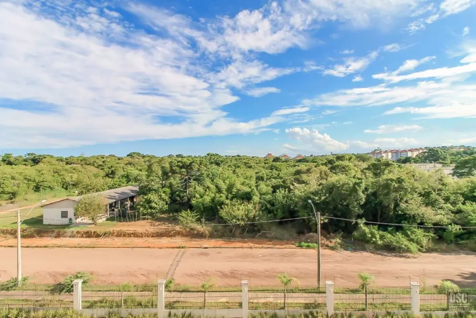 Foto 6 de Apartamento com 2 quartos à venda, 58m2 em Vila Nova, Porto Alegre - RS