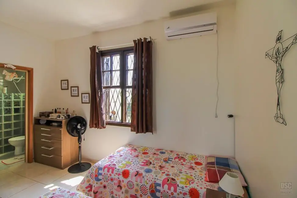 Foto 9 de Casa com 11 quartos à venda, 338m2 em Santa Tereza, Porto Alegre - RS